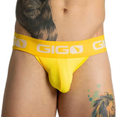 Bright yellow gigo colors yellow jock briefs with mesh texture and white logo band front view