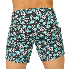 Black swim trunks by gigo comics beachwear with turquoise and white cartoon monster pattern for beach use