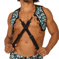 Black gigo comics vest harness with teal and white skull pattern adjustable straps and metal rings visible on front