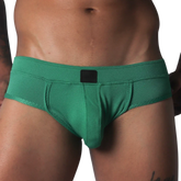 Green textured briefs with a supportive contour pouch, low-rise waistband, and small black logo patch.