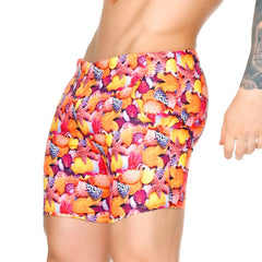 Vibrant gigo corals beachwear high-waisted swim trunks with bold seashell and starfish print in orange pink yellow and purple