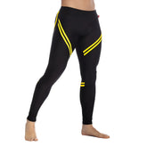 Gigo core black leggings with bold yellow diagonal stripes and a snug form-fitting athletic design