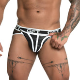 Black and white striped latex briefs with mesh back panel shown from the back in gigo fetiche white brief jockstrap
