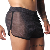 Sheer black glittery mesh shorts with a slim athletic fit and solid black trim edging.