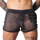 Sheer black metallic glitter shorts with a comfortable elastic waistband and black hem trim.