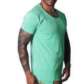 Flash green scoop-neck t-shirt with a metallic, shimmering finish worn by a tattooed man.