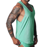 Flash green, metallic-finish racerback tank top with deep-cut armholes, worn by a muscular man.