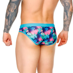 Vibrant blue and pink butterfly patterned gigo flowers swim brief with teal waistband for swimming and beachwear