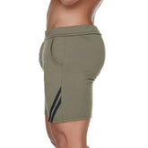 Gigo Forever Long green athletic shorts with black diagonal stripes on the side for active wear