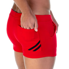 Red athletic shorts with black diagonal stripes on side pockets from gigo forever for sports and casual wear