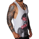 White racerback tank top featuring a graphic of Freddie Mercury with red text bars and a black star.