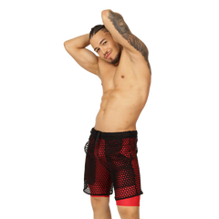 Gigo fresh red short featuring red and black mesh shorts with sheer perforated design over red inner leggings