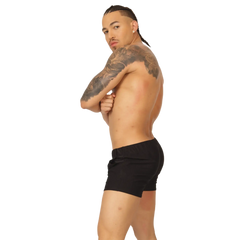 Black athletic shorts with a simple sleek design from Gigo Glow ideal for sports and casual wear