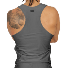 Back view of gigo glow gray tank made of gray ribbed fabric with a small black tag at the neck