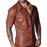Brown short-sleeved faux leather button-down shirt with a classic collar, worn open over a bare chest.
