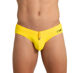 Bright yellow men’s swim trunks gigo hot yellow swim brief with drawstring closure and black hashtag branding on the side