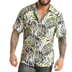 A men’s short-sleeved button-up Gigo Jungle shirt with vibrant green gray and white tropical leaf pattern