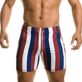 Men’s Gigo Line Beachwear swim trunks with red white and blue vertical stripes and a drawstring waistband
