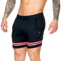 Black gigo medieval candy short athletic shorts with bright pink stripes at hem and circular logo on side pocket