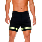 Black gigo medieval yellow short athletic shorts with two neon green horizontal stripes near the hem