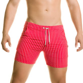 Red swim trunks with white vertical stripes and a drawstring waistband from gigo naval red beachwear collection
