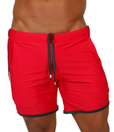Red athletic shorts with black trim and drawstring waistband from Gigo Nice red beachwear collection for casual wear