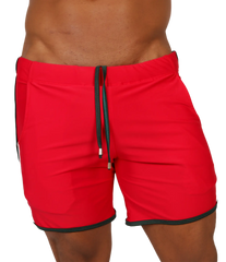 Red athletic shorts with black trim and drawstring waistband from Gigo Nice red beachwear collection for casual wear