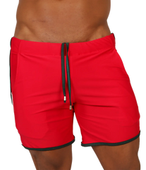 Red athletic shorts with black trim and drawstring waistband from Gigo Nice red beachwear collection for casual wear