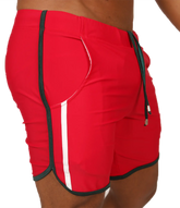 Red athletic shorts with white and black trim and drawstring waistband from gigo nice red beachwear collection