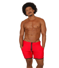 Bright red gigo nice red beachwear swim trunks with black trim and matching drawstring for beach use