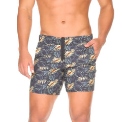 Men’s dark gray Gigo Palms beachwear swim trunks with vibrant gold and teal tropical leaf pattern and black zipper fly