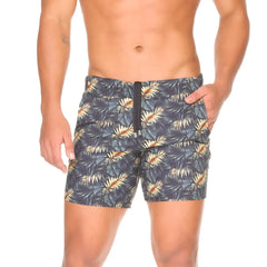 Men’s dark gray Gigo Palms beachwear swim trunks with vibrant gold and teal tropical leaf pattern and black zipper fly