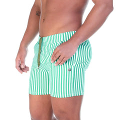 Green and white vertically striped swim trunks with drawstring waistband from gigo polo green beachwear collection