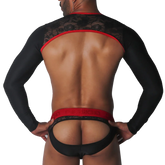 Black lace long-sleeve harness with red trim and matching red-accented, open-back jockstrap.