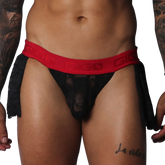 Black lace Gigo mini skirt with a red branded elastic waistband and sheer floral pattern detail.
