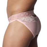 Romantic pink brief featuring a branded elastic waistband, floral lace accents, and sheer, ribbed fabric.