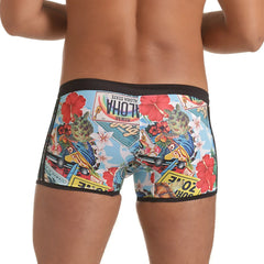 Gigo Seventies swim trunks featuring vibrant red hibiscus flowers vintage hawaiian plates and surfboards on light blue