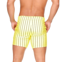 Bright yellow swim trunks with bold black vertical stripes from gigo sultan yellow beachwear collection