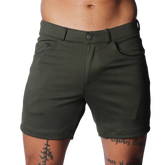 Dark olive green fitted shorts with belt loops, front pockets, and a button fly closure.