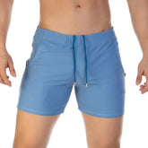 Light blue Gigo traditional beachwear athletic shorts with drawstring waistband and side pockets for casual wear