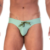 Gigo traditional green swim brief in mint green with olive green drawstring and silver metal hardware for swimming