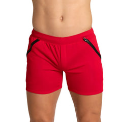 Gigo training red athletic shorts with black side zipper accents designed for active wear and training sessions