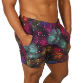 Gigo universe beachwear vibrant galaxy-print swim trunks with magenta teal and purple nebulae and star-like dots