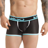 Black gigo men’s boxer briefs with light blue waistband and white dot pattern in versatile blue trunk design