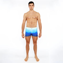 Men’s gradient printed swim shorts with blue ocean gradient design made from stretchy fabric for comfort and flexibility