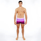 Purple gradient printed swim shorts with white waistband designed for comfortable beach and pool use