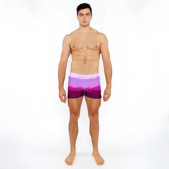 Purple gradient printed swim shorts with white waistband designed for comfortable beach and pool use
