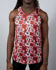 A vibrant red pink and white floral print hawaiian hibiscus tank top with a round neckline perfect for summer wear