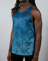 Blue tank top with hibiscus ombre print and black outlined floral pattern perfect for casual summer wear