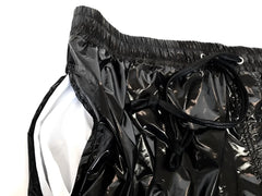 High gloss shorts in black glossy nylon with white inner lining and elastic waistband for comfortable wear